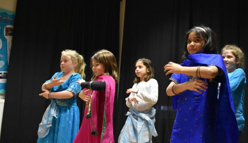 girls stood on stage