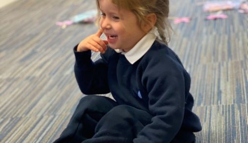 girl sat on the floor