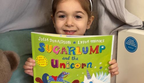 Pupil with her favourite book