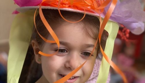 Nursery girl in Easter bonnet