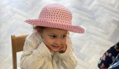 Nursery girl in Easter bonnet