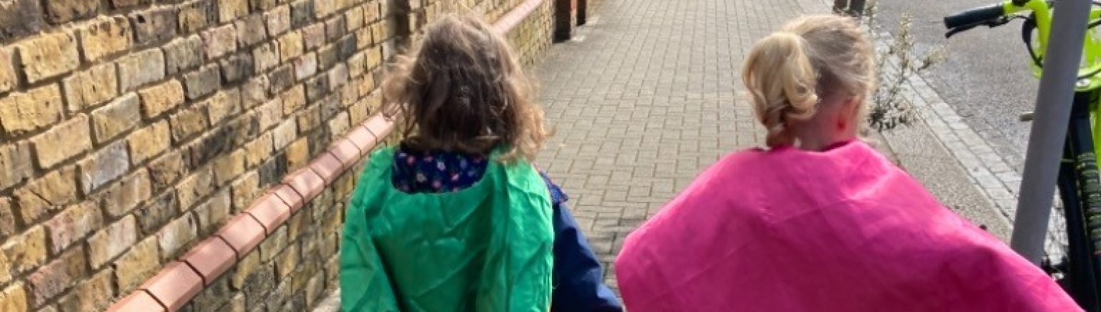 Girls dressed as superheroes for walk to school week