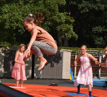 Girls play 'Last Man Standing' at the Falcons PFA Fair